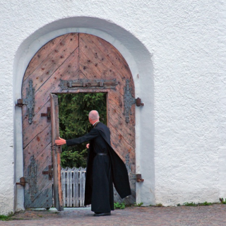 man opening door