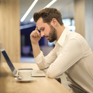 a man in an online therapy session